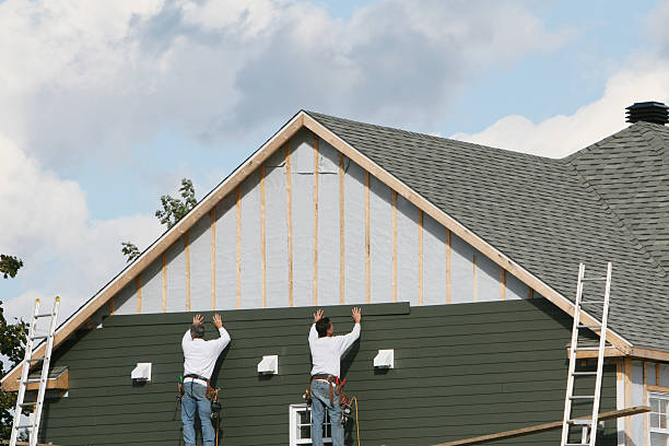 Professional Siding Contractor technician working in Baden, PA